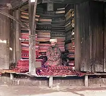 Marchand de tissu à Samarcande au début du XXe&nbsp;siècle (photographie de Prokoudine-Gorski)