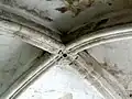 Clé de voûte de la travée à l'ouest du clocher.