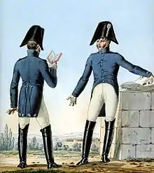 Deux hommes face à face discutant.
