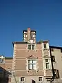 Utilisation des briques rouges dans le plus style qu'on retrouve à Toulouse et Albi