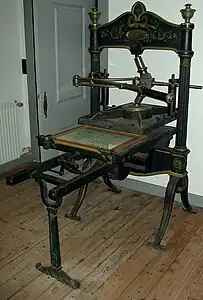 Presse à levier.