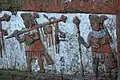 Guerriers (bas-relief peint).