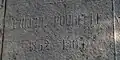 Inscription funéraire sur la sépulture.