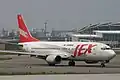 Boeing 737-400 à l'aéroport de Fukuoka au Japon