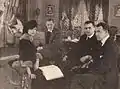 Doris Rankin, Lionel Barrymore, le producteur Whitman Bennett, et le réalisateur Kenneth S. Webb en train de relire le script du film