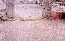 Maison de Kerkouane avec une mosaïque portant le signe dit de Tanit (fin du IVe -début du IIIe&nbsp;siècle&nbsp;av. J.-C.).