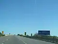 Signalisation de bienvenue sur l'autoroute 404.