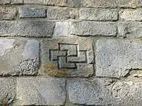 Double croix gammée sur le mur de l'église collégiale du XIIe siècle à Kruszwica.