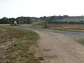 Le carrefour, au sud-ouest du bourg en limite de la commune de Saint-Mary. Vue vers le Bois de Bel-Air.
