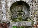 Ancienne fontaine murale du XVIIIe siècle.