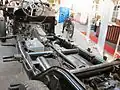 Configuration FR sur Mercedes 770K (1938) : moteur et boîte de vitesses en haut à gauche ; arbre de transmission au milieu ; différentiel arrière en bas à droite.
