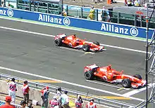 Photo des deux Ferrari 248 F1 en première ligne du Grand Prix de France 2006