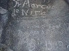 &nbsp;Inscription moderne apocryphe, gravée vers 1930 sur un rocher du Pima Canyon, en Arizona, souvent mais faussement attribuée à Frère Marc de Nice[1].