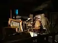 Mise en scène du grenier de la maison.