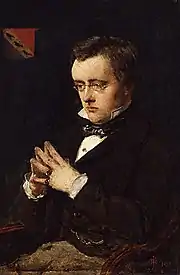Tableau. Collins, romancier ami de Dickens, maître du roman à sensation, visage assez plat, mains jointes, environ 40 ans, regard songeur