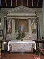 Église paroissiale Saint-Pierre : autel et retable du Sacré-Cœur.