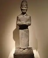 Statue en pierre calcaire d'un préposé au deuil, VIIe siècle