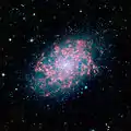 NGC 7793 vue dans le domaine des infrarouges par le télescope spatial Spitzer.