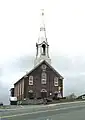 L'ancienne église Notre-Dame-de-Laurentides, incendiée en 1991