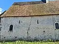 Mur nord de la nef, ouvertures et appareil du premier roman