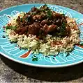 Orez shu'it (en) (אורז שעועית), spécialité jérusalémite (haricots, sauce tomate et riz).