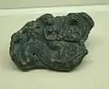 Fragment d'une tablette en pierre de Gandhara.