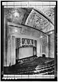 1932 view looking down from the balcony at the ceiling, proscenium, curtain, seating and hydraulic orchestra pit[Traduire&nbsp;passage]