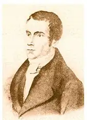 Gravure en sépia représentant le buste de Schmerling de trois quarts gauche. Il porte les cheveux courts et des petits favoris ; il est vêtu d’une redingote à très large col.