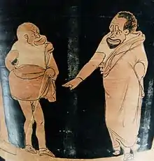 Scène de pièce de phlyax : maître (à droite) et esclave (à gauche), cratère en calice à figures rouges de Sicile, v.&nbsp;350-340 av. J.-C. Musée du Louvre.