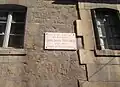 Détail de la plaque, par l'Université populaire.