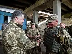 En 2016 avec Petro Porochenko.