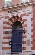 no&nbsp;34 : le portail de la rue des Lois.