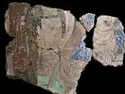 Couple richement paré. Scène de la prédication du Bouddha. Kucha, Duldur-āqur, sanctuaire du nord-est. Xinjiang. Peinture murale, début du VIe&nbsp;siècle. Musée national des Arts asiatiques - Guimet, Paris.