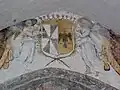 Fresques de l'église de Saint-Caprais avec représentation du blason de la commune.