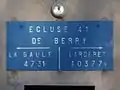 Panneau sur la maison éclusière.