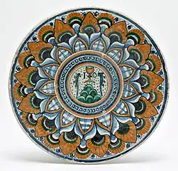 Assiette à décor « oeil de plume de paon », Faenza, fin du XVe siècle.