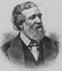 Portrait d'un homme entre deux âges, les cheveux bruns et la barbe grisonnante. Il porte un costume classique de la fin du XIXe siècle.