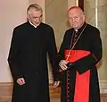 Roman Indrzejczyk&nbsp;(pl)(à gauche),aumônier du président [28]