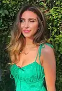 Ryan Newman interprète Claudia Shepard.