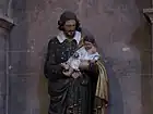 Statue de saint Vincent-de-Paul portant l'enfant Jésus (1829).
