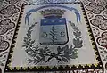 Mosaïque représentant le blason de Saint-Cannat à l'intérieur de l'église.