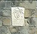 Stèle avec le nom de l'architecte.