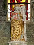 Statue de sainte Barbe en pierre polychrome du XVIe siècle