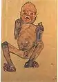 Portrait de face d'un bébé grimaçant, bras et jambes repliés