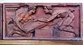 Bas-relief en terre cuite de la façade.