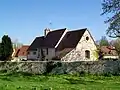 L'ancien Hôtel-Dieu des Marais, route de St-Léonard, près du quartier Brichebay.