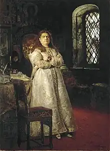 Portrait d'une femme, l'air sévère.