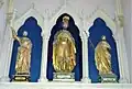 Nouvelle église : statues du retable de l'autel du bas-côté.