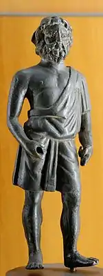 Vulcain portant la tunique et le bonnet conique des artisans, bronze romain du Ier&nbsp;siècle ap. J.-C., musée des Beaux-Arts de Lyon.