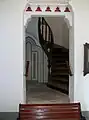 Un des escaliers mennant à l'étage supérieur.